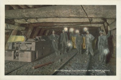 American Coal Mining: Hauling Cars by Electric Motor 1000 ft Below Surface by American Photographer