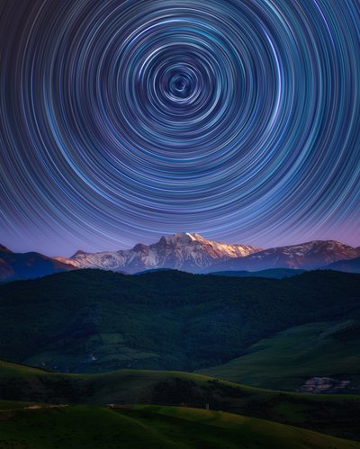 Star Trails Over Mountains by Asef Azimaie