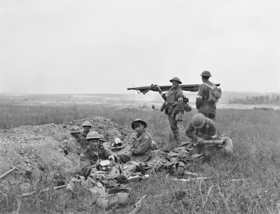 A scene during the battle of Hamel, showing American and Australian stretcher bearers working together in the front line area, after the infantry had passed, 4 July 1918 by Australian Photographer