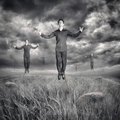Levitating Men Stormy Sky by Baden Bowen