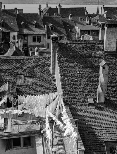 Gabled rooftops and laundry drying on ancient Italian village houses by Bernard F. Rogers