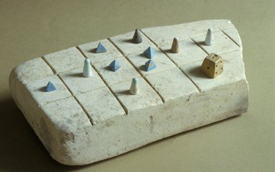 Game board with playing pieces, from Tell Beit Mirsim, Jordan, c.1200 BC by Bronze Age