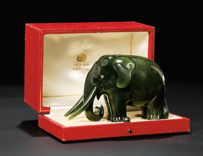 A jewelled nephrite model of an elephant, with diamond-set eyes, c.1900 by Carl Fabergé