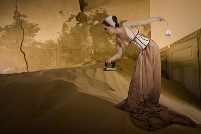 Vintage Woman Ironing Sand by Christine von Diepenbroek