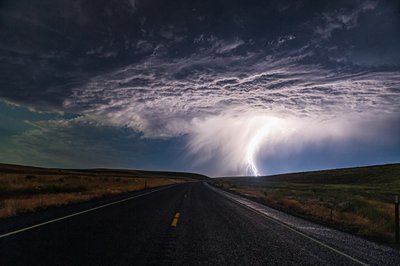 Lightning Strikes Open Road by Chuanxu Ren