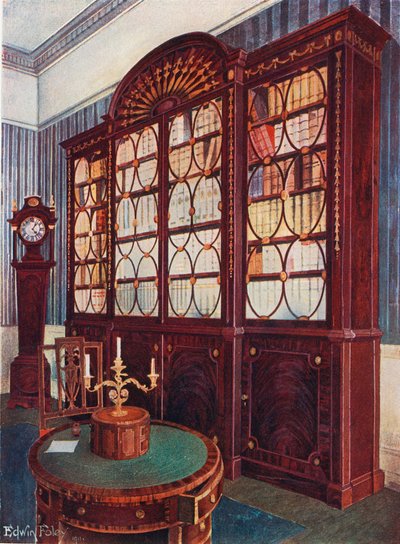 Inlaid Mahogany Break-Front Bookcase. Mahogany Pedestal Centre Table. Mahogany High-Case Clock by Edwin John Foley