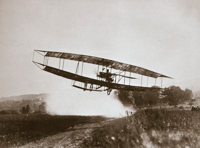 American aviator Glenn Curtiss making the first heavier-than-air flight in his 