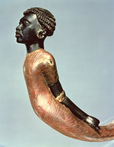 Figure of an African man from the end of a ceremonial cane, from the tomb of Tutankhamun by Egyptian 18th Dynasty