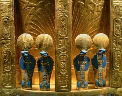 Reverse side of the throne of Pharaoh Tutankhamun with four golden uraeus cobra figures by Egyptian 18th Dynasty