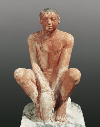 Egyptian civilization, painted limestone statue depicting man modeling clay by Egyptian 5th Dynasty