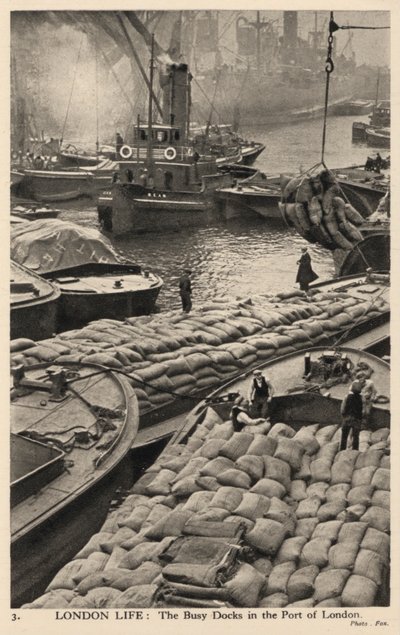 Boats and barges in the busy docks of the port of London by English Photographer