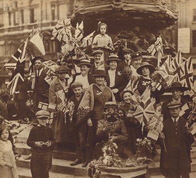 Celebrating Victory in the First World War in Piccadilly Circus, London by English Photographer