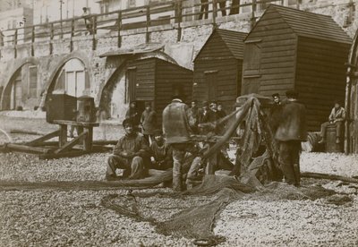 Fishermen with their nets on the beach in Brighton by English Photographer