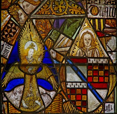 A panel in the east window depicting a feathered angel and an angel with a shield of arms amid fragments by English School