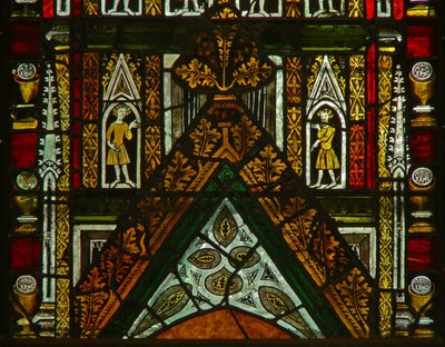 A window in the Lady Chapel depicting canopy figures by English School