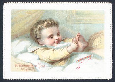 Baby in Bed Playing with Toes by English School