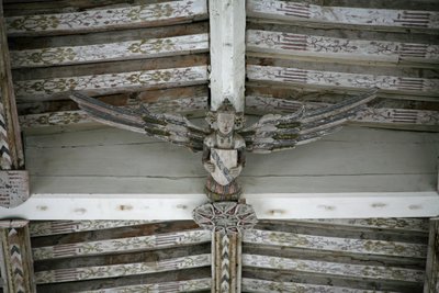 View of one of the carved wooden angels in the nave by English School