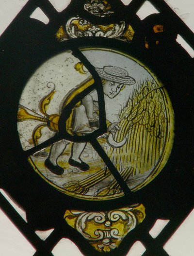 Window depicting the Labours of the Months: August by English School
