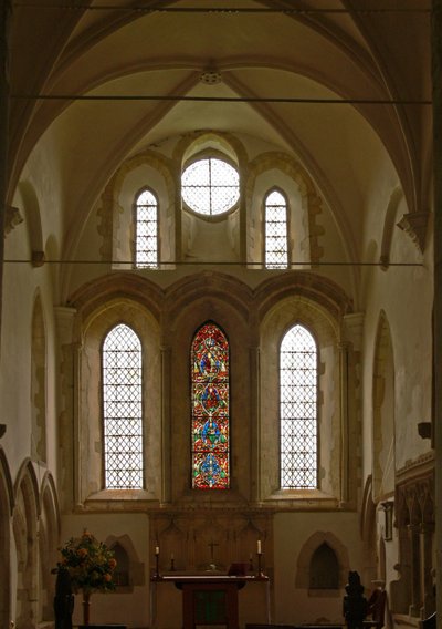 Window depicting a view of the east end of the choir with the Tree of Jesse window by English School