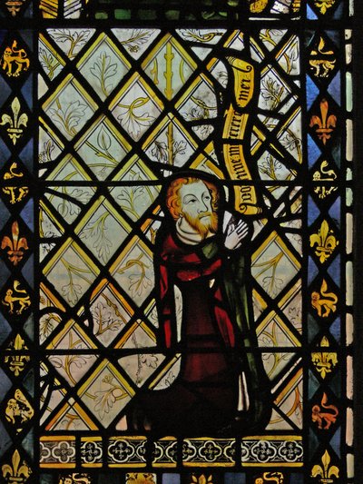 Window depicting quarries and a border of fleurs de lis and lions surround the donor by English School