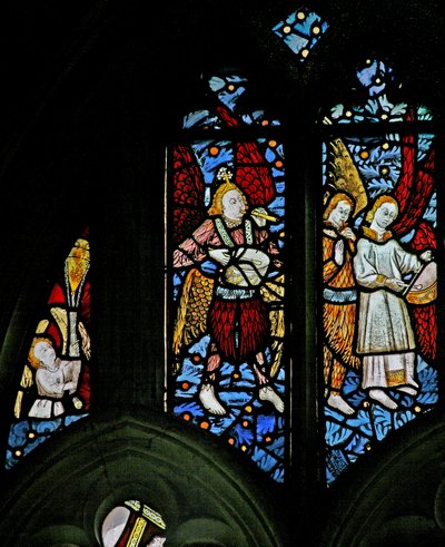 Window depicting an angel censing; musician angels with pipe and tabor by English School