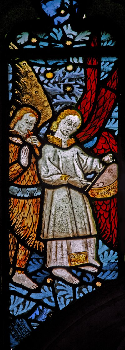 Window depicting musician angels with pipe and tabor by English School