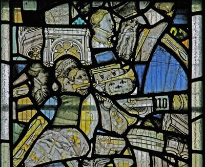 Window depicting details including trumpeters, fragments from a Crucifixion scene, heads and architectural details by English School
