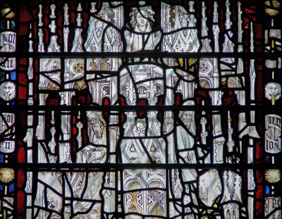Window depicting a canopy with figures by English School