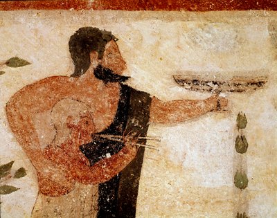 A bearded man presenting a cup, near him a musician (detail) by Etruscan