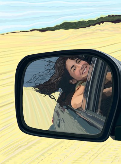 Young Woman Seen Smiling in Sideview Mirror of Car Driving On Beach by Evan Sklar