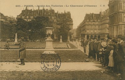 Bird charmer in the Jardin des Tuileries, Paris by French Photographer
