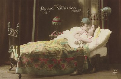 Couple kissing in bed by French Photographer