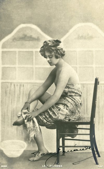 Woman in a bath towel by French Photographer