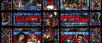 Window depicting the Crucifixion with the sun and moon by French School