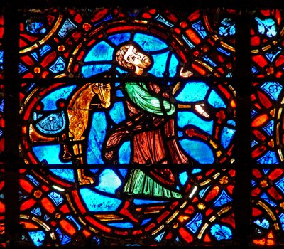 Window w12 depicting a scene in the Good Samaritan window: the Samaritan gets off his horse by French School