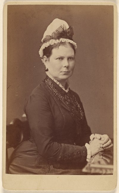 Unidentified Woman Wearing a Bonnet with a Bow, Seated with Hands Together by George Washington Wilson
