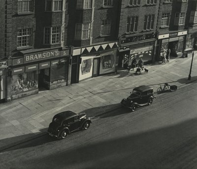 Street Scene in London by Godfrey Macdominic