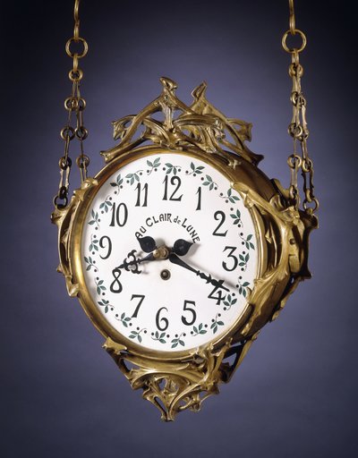 A double-dialed hanging clock by Hector Guimard