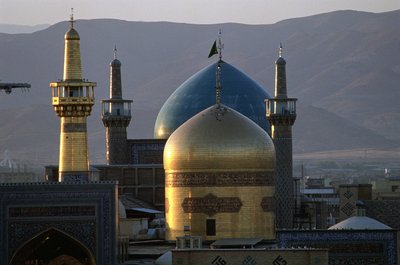 The all-gold dome and minaret of the shrine of Imam Reza, with the Timurid Gowhar Shad Mosque behind by Islamic School