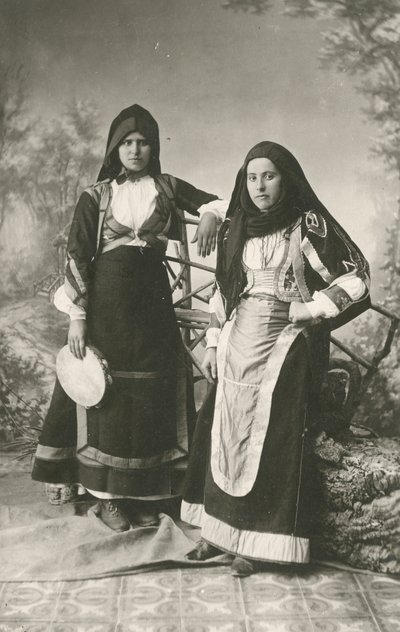 Two women wearing traditional clothes from Belvi and Aritzo, Sardinia, Italy, circa 1910 by Italian Photographer