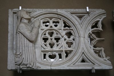 Carved rose wheel transenna with the donor Francesco de Felici by Italian School
