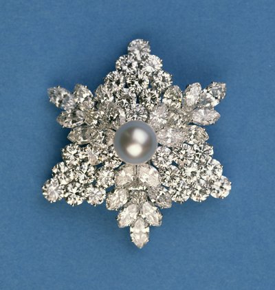Circular and marquise diamond snowflake brooch by Bulgari by Italian School