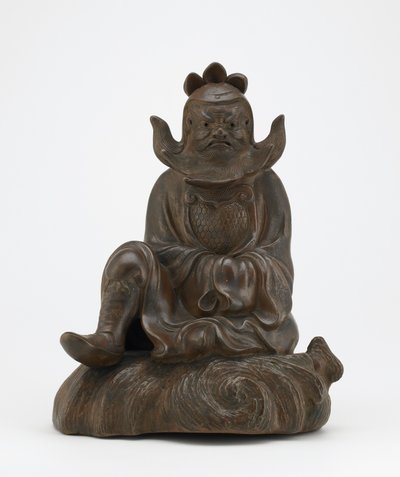 Figure of Shoki, the demon queller, seated on a rock, Edo period or Meiji era by Japanese School