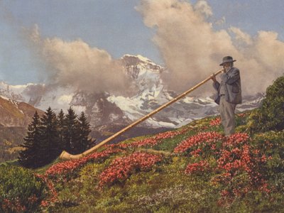Switzerland: An Alphorn Blower, the Jungfrau in the background by Jean Gaberell