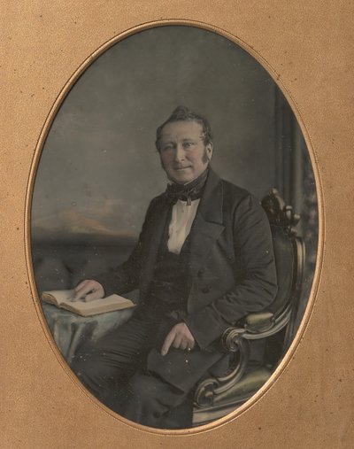 Seated Man Pointing to a Passage in an Open Book by John Jabez Edwin Mayall