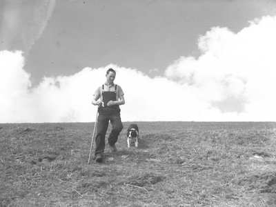 A Man and His Sheepdog Walking in Martindale by Joseph Hardman