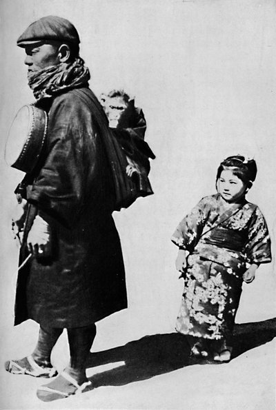 With his drum and monkey he is Japan
