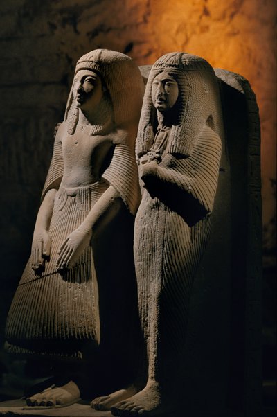 Limestone double statue of a priest named Amenemipet and his wife, New Kingdom by Kenneth Garrett