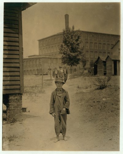 12 year old Eddie Norton, makes about 40 cents a day as a sweeper at Saxon Mill, Spartanburg, North Carolina by Lewis Wickes Hine
