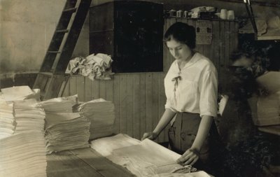 15-Year-Old Girl Folding Towels in Bonanno Laundry, Boston, Massachusetts by Lewis Wickes Hine